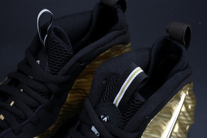 air foamposite pro “metallic gold” black mens 624041-701