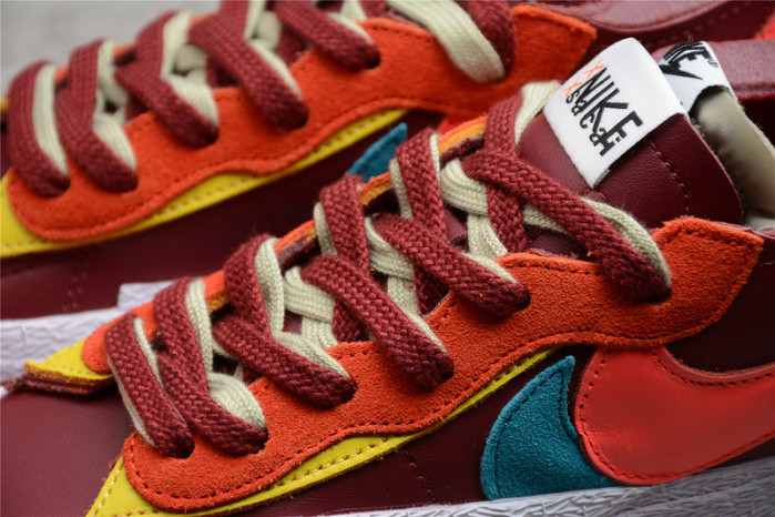 nike blazer low sacai kaws red dm7901-600