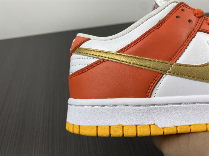 nike dunk low university gold (w) dq4690-800