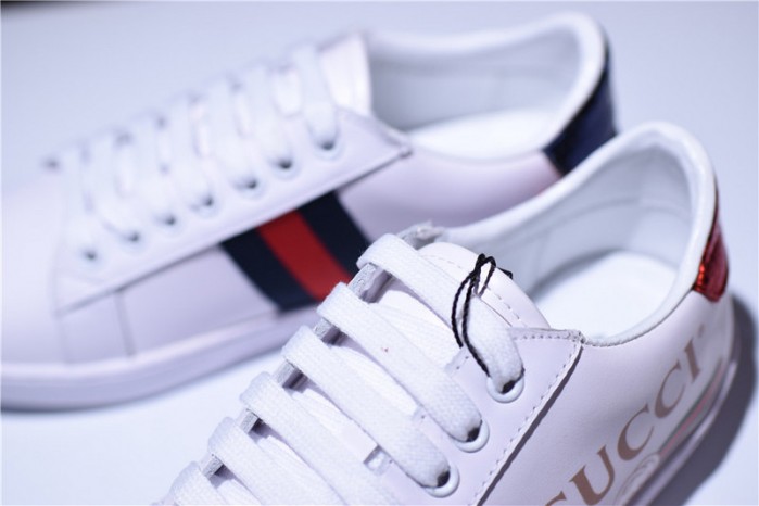 gu ace embroidered low-top sneaker with logo