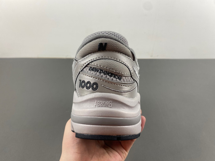 new balance 1000 silver reflective m1000te